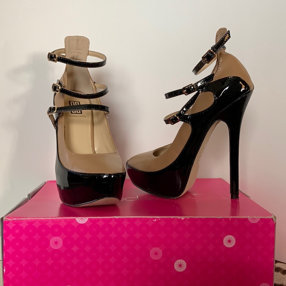 Tan and black pumps